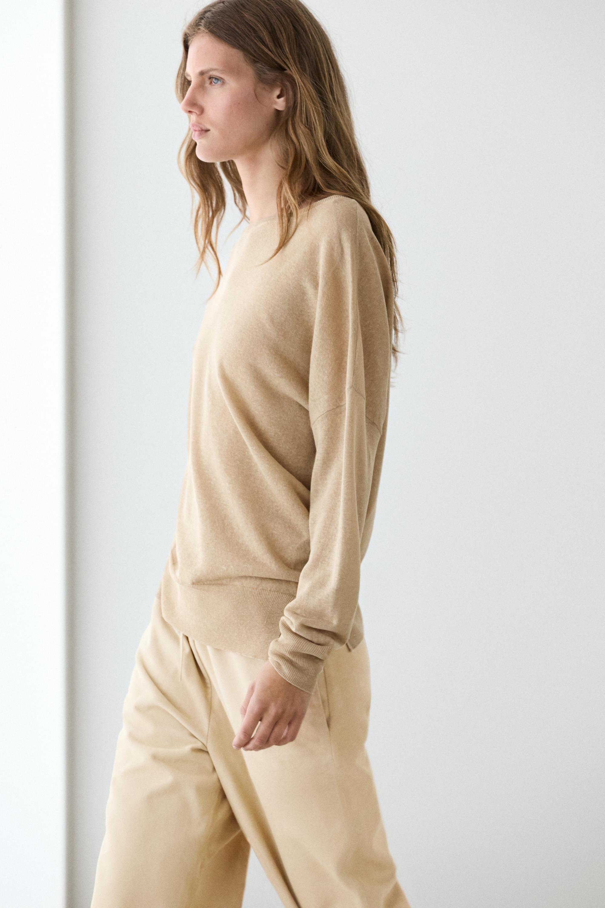 Flowing 100% linen off-the-shoulder sweater